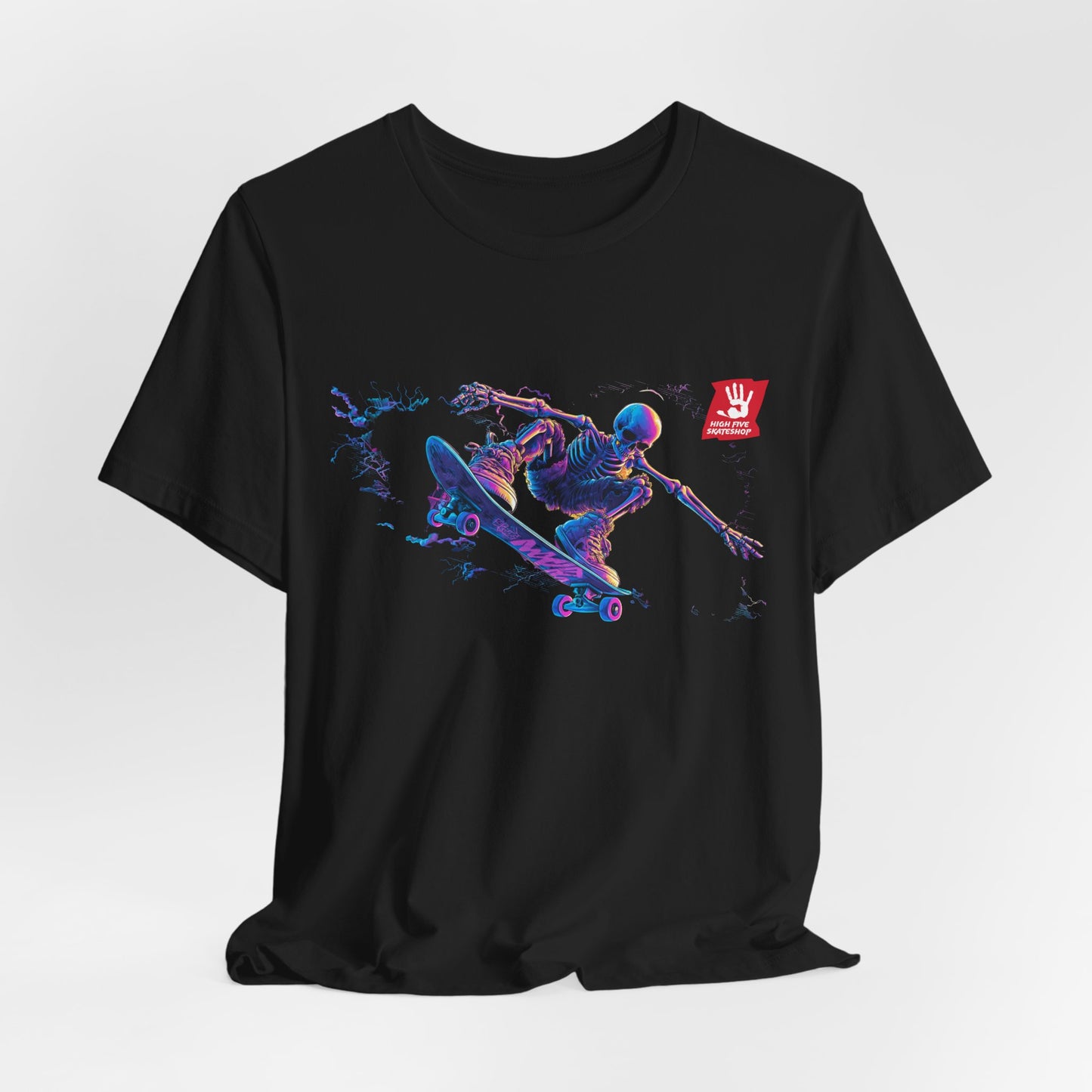 Skateboarder Action Graphic Tee — Dynamic Neon Skeleton Skateboard T‑Shirt