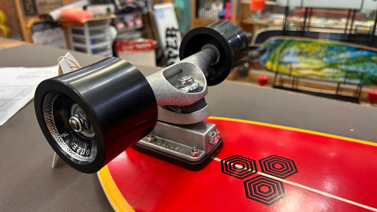 Carver x Channel Islands Fish 29.25 C7 truck and wheel close-up