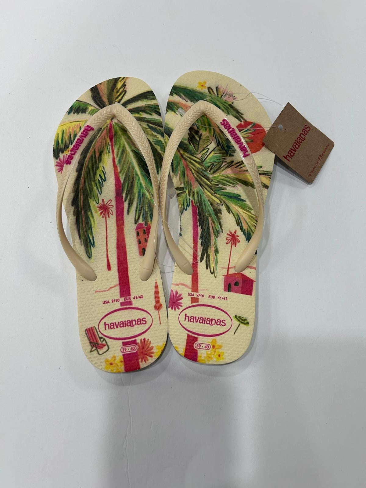 Beige Havaianas slim flip flops with green palm trees and pink tropical print